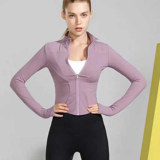Woman wearing sleek fit yoga jacket for workouts and summer jogging