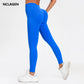 Woman wearing blue seamless gym leggings with high waist tummy control fit